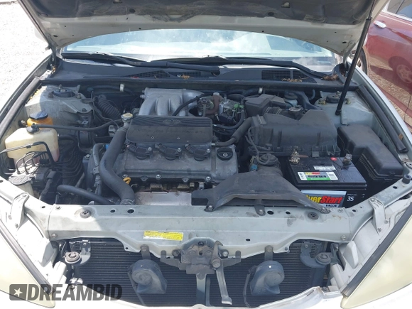 2002 Toyota Camry XLE z VIN 4T1BF32K42U531992, wystawiony jako IAAI lot #42294926 z przebiegiem 294 929 mil mil oraz . Historia ofert i sprzedaży dostępna na DreamBid. Obrazek 10.