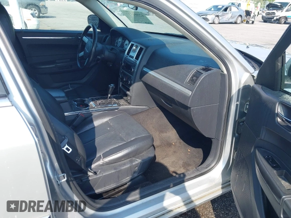 2008 Chrysler 300 Touring with VIN 2C3LK53G38H233492, listed as a IAAI auction lot 42004537 with 200,695 mi miles and . Bid and sale history available at carsss.com. Image 5.