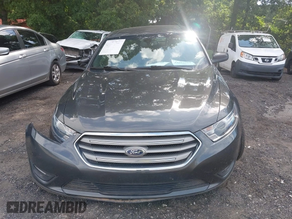 2017 Ford Taurus SEL with VIN 1FAHP2E82HG132551, listed as a IAAI auction lot 42633317 with 80,785 mi miles and . Bid and sale history available at DreamBid. Image 12.