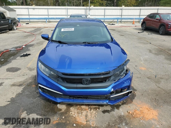 2019 Honda Civic LX with VIN 19XFC2F63KE016017, listed as a Copart auction lot 50440945 with 122,073 mi miles and Salvage Title. Bid and sale history available at DreamBid. Image 5.