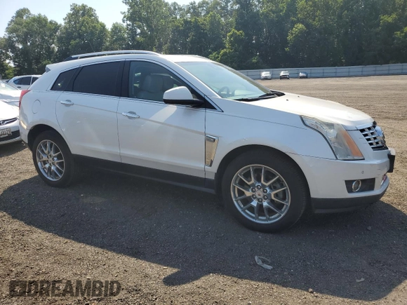 2014 Cadillac SRX Performance Collection with VIN 3GYFNCE38ES629600, listed as a Copart auction lot 61622725 with 86,183 mi miles and Salvage title. Bid and sale history available at DreamBid. Image 4.