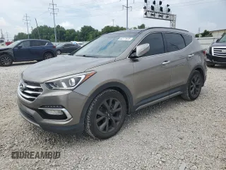 2017 Hyundai Santa Fe Ultimate z VIN 5XYZW4LAXHG386434, wystawiony jako Copart lot #64177675 z przebiegiem 135 236 mil mil oraz Szkoda całkowita • Salvage title. Historia ofert i sprzedaży dostępna na DreamBid. Obrazek 1.