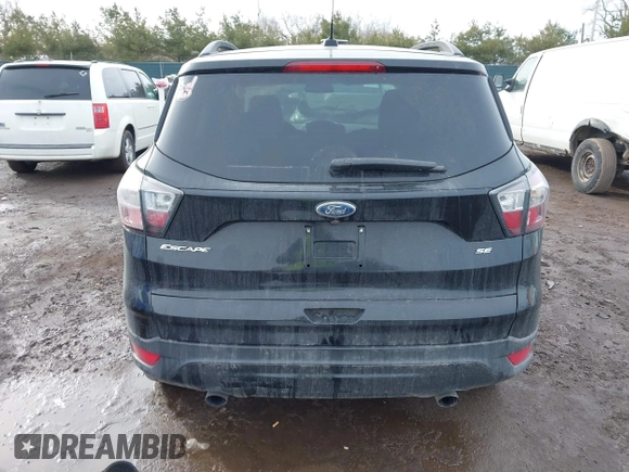 2017 Ford Escape SE with VIN 1FMCU0GD4HUA76833, listed as a IAAI auction lot 41642460 with 116,435 mi miles. Bid and sale history available at carsss.com. Image 16.
