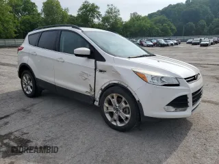 2016 Ford Escape SE z VIN 1FMCU9G97GUB45352, wystawiony jako Copart lot #60001055 z przebiegiem 93 685 mil mil oraz Szkoda całkowita • Salvage title. Historia ofert i sprzedaży dostępna na DreamBid. Obrazek 4.