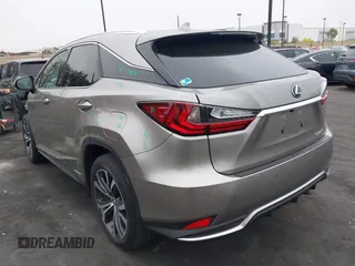 2022 Lexus RX 450h with VIN 2T2HGMDA7NC072735, listed as a IAAI auction lot 42356852 with 62,835 mi miles and . Bid and sale history available at DreamBid. Image 3.