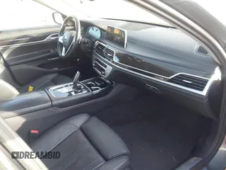 2018 BMW 7 Series 740i with VIN WBA7E2C55JB214987, listed as a IAAI auction lot 41733790 with 96,738 mi miles. Bid and sale history available at carsss.com. Image 5.