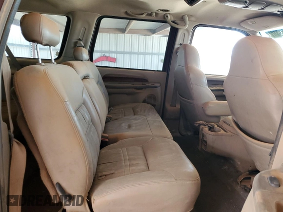 2001 Ford Excursion Limited z VIN 1FMNU43S31EA19303, wystawiony jako Copart lot #55433165 z przebiegiem 319 470 mil mil oraz Czysty tytuł • Clean title. Historia ofert i sprzedaży dostępna na DreamBid. Obrazek 11.
