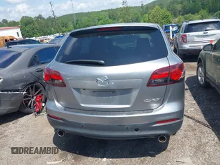 2015 Mazda CX-9 Touring with VIN JM3TB2CA2F0451180, listed as a IAAI auction lot 42180078 with 112,804 mi miles and . Bid and sale history available at carsss.com. Image 16.