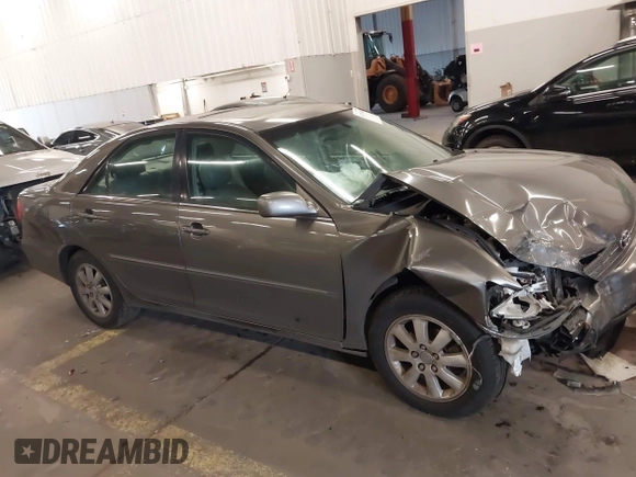 2003 Toyota Camry LE with VIN 4T1BE32K13U754348, listed as a IAAI auction lot 41765418 with 194,227 mi miles and . Bid and sale history available at DreamBid. Image 14.