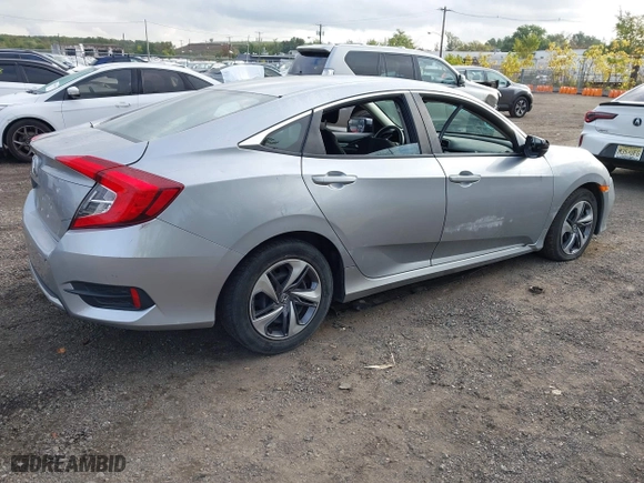 2019 Honda Civic Sedan LX with VIN 2HGFC2F65KH586106, listed as a IAAI auction lot 40486735 with 82,714 mi miles. Bid and sale history available at carsss.com. Image 4.