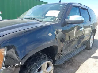 2014 Chevrolet Tahoe LT z VIN 1GNSCBE02ER181908, wystawiony jako IAAI lot #41628601 z przebiegiem 189 151 mil mil oraz . Historia ofert i sprzedaży dostępna na DreamBid. Obrazek 6.