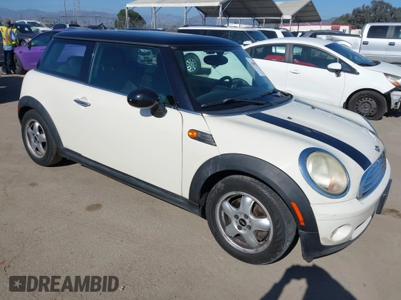 2010 MINI Hardtop with VIN WMWMF3C59ATZ66563, listed as a IAAI auction lot 42098521 with 153,734 mi miles and . Bid and sale history available at DreamBid. Image 1.
