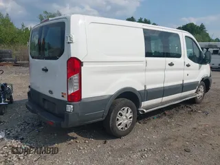 2015 Ford Transit Cargo z VIN 1FTNR1ZM5FKA65799, wystawiony jako IAAI lot #42473586 z przebiegiem 99 756 mil mil oraz . Historia ofert i sprzedaży dostępna na DreamBid. Obrazek 4.