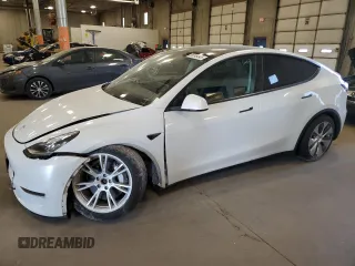 2022 Tesla Model Y Long Range z VIN 7SAYGDEE1NF313967, wystawiony jako Copart lot #56749345 z przebiegiem 55 083 mil mil oraz Szkoda całkowita • Salvage title. Historia ofert i sprzedaży dostępna na DreamBid. Obrazek 1.
