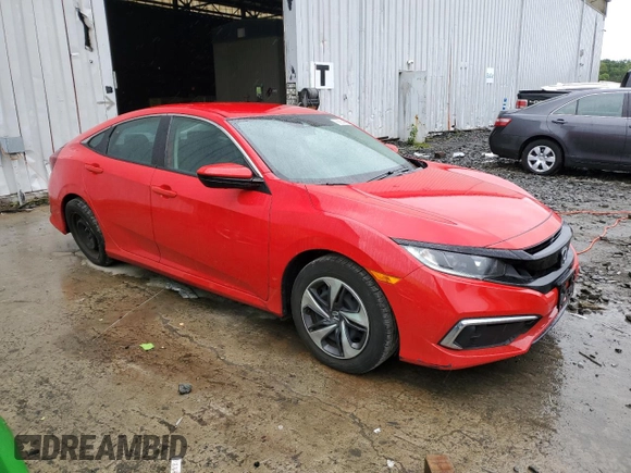2020 Honda Civic LX with VIN 2HGFC2F69LH569083, listed as a Copart auction lot 56874685 with 79,770 mi miles and Salvage title. Bid and sale history available at DreamBid. Image 4.