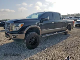 2017 Nissan Titan Platinum Reserve with VIN 1N6BA1F43HN568650, listed as a Copart auction lot 59593525 with 126,193 mi miles and Salvage title. Bid and sale history available at DreamBid. Image 1.