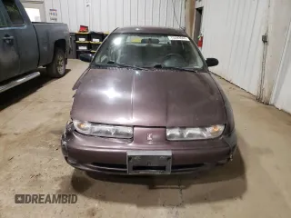 1998 Saturn SW z VIN 1G8ZK8271WZ165967, wystawiony jako Copart lot #73493044 z przebiegiem Nie podano mil oraz Szkody całkowita. Historia ofert i sprzedaży dostępna na DreamBid. Obrazek 5.