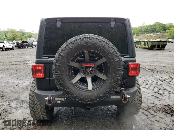 2018 Jeep Wrangler Unlimited Sport S z VIN 1C4HJXDG4JW137697, wystawiony jako Copart lot #56577525 z przebiegiem 42 297 mil mil oraz Szkoda całkowita • Salvage title. Historia ofert i sprzedaży dostępna na DreamBid. Obrazek 6.