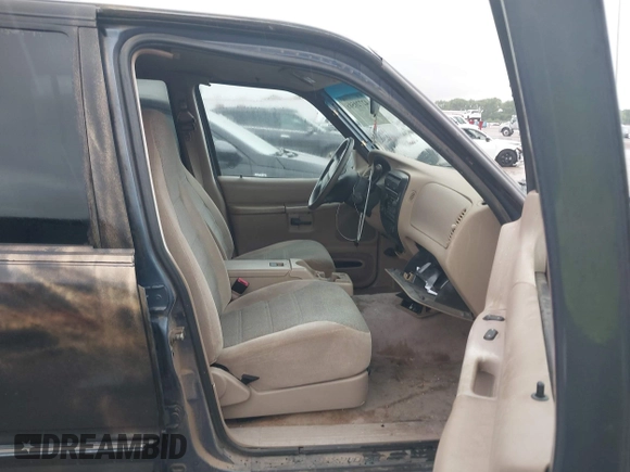 2000 Ford Explorer XLS z VIN 1FMZU62X7YZB81285, wystawiony jako IAAI lot #42720506 z przebiegiem 92 852 mil mil oraz . Historia ofert i sprzedaży dostępna na DreamBid. Obrazek 5.