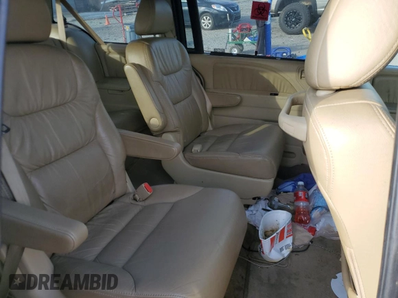 2009 Honda Odyssey EX-L with VIN 5FNRL38649B413532, listed as a Copart auction lot 79867014 with 308,701 mi miles and Salvage Title. Bid and sale history available at DreamBid. Image 11.