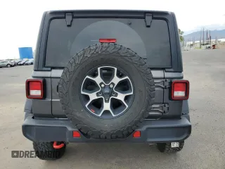 2022 Jeep Wrangler Unlimited Rubicon with VIN 1C4HJXFN9NW256461, listed as a Copart auction lot 43188065 with 26,944 mi miles and Salvage title. Bid and sale history available at DreamBid. Image 6.