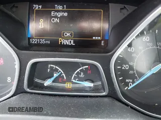 2015 Ford Focus SE with VIN 1FADP3F21FL296327, listed as a IAAI auction lot 42171777 with 122,135 mi miles and . Bid and sale history available at DreamBid. Image 7.
