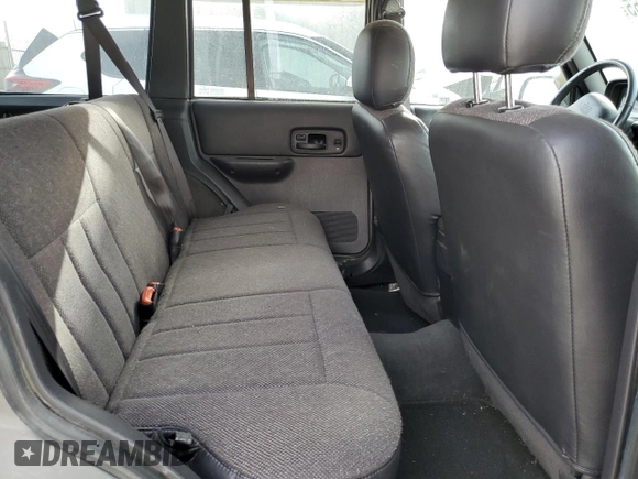 2001 Jeep Cherokee Sport z VIN 1J4FF58SX1L576572, wystawiony jako Copart lot #48982965 z przebiegiem 174 500 mil mil oraz Szkoda całkowita • Salvage title. Historia ofert i sprzedaży dostępna na DreamBid. Obrazek 11.