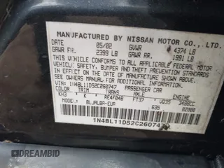 2002 Nissan Altima SE with VIN 1N4BL11D52C260747, listed as a IAAI auction lot 41733376 with 151,750 mi miles. Bid and sale history available at carsss.com. Image 9.
