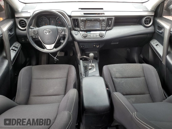 2018 Toyota RAV4 XLE with VIN JTMWFREV1JJ742694, listed as a Copart auction lot 51093695 with 74,502 mi miles and Salvage Title. Bid and sale history available at DreamBid. Image 8.