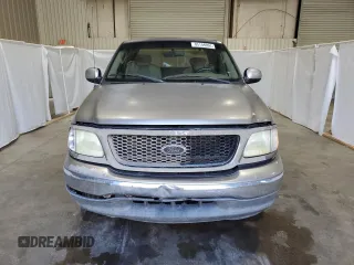 2003 Ford F-150 XL with VIN 1FTRX17283NA46215, listed as a Copart auction lot 85194094 with 168,415 mi miles and Salvage title. Bid and sale history available at DreamBid. Image 5.