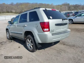 2008 Jeep Grand Cherokee Laredo with VIN 1J8GR48K28C169859, listed as a IAAI auction lot 41965149 with 166,069 mi miles. Bid and sale history available at carsss.com. Image 3.