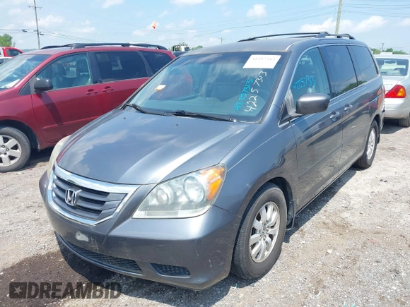 2010 Honda Odyssey EX with VIN 5FNRL3H42AB110879, listed as a IAAI auction lot 42257313 with 197,190 mi miles and . Bid and sale history available at DreamBid. Image 6.