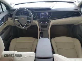 2023 Cadillac XT6 FWD Premium Luxury with VIN 1GYKPCRS4PZ103819, listed as a Copart auction lot 76279704 with 19,601 mi miles and Clean Title. Bid and sale history available at carsss.com. Image 8.