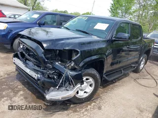 2022 Toyota Tacoma SR with VIN 3TYCZ5AN0NT074683, listed as a IAAI auction lot 42117875 with 51,112 mi miles and . Bid and sale history available at DreamBid. Image 17.