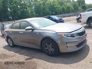 2016 Kia Optima LX z VIN 5XXGT4L34GG097375, wystawiony jako IAAI lot #42401993 z przebiegiem 145 389 mil mil oraz . Historia ofert i sprzedaży dostępna na DreamBid. Obrazek 1.
