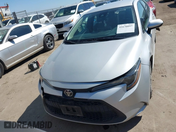 2021 Toyota Corolla LE with VIN 5YFEPMAE2MP166647, listed as a IAAI auction lot 41670097 with 143,557 mi miles. Bid and sale history available at carsss.com. Image 12.