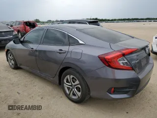 2017 Honda Civic LX z VIN 19XFC2F53HE043251, wystawiony jako Copart lot #53965175 z przebiegiem 91 156 mil mil oraz Czysty tytuł • Clean title. Historia ofert i sprzedaży dostępna na DreamBid. Obrazek 2.