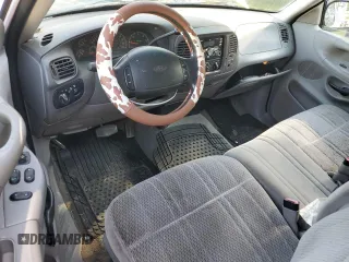 1998 Ford F-150 z VIN 1FTZX18W2WNC09396, wystawiony jako Copart lot #60355505 z przebiegiem 221 565 mil mil oraz Czysty tytuł • Clean title. Historia ofert i sprzedaży dostępna na DreamBid. Obrazek 8.