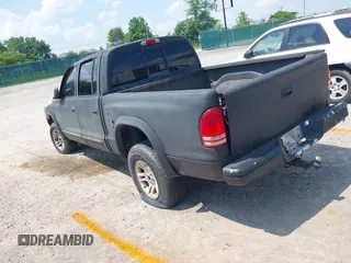 2004 Dodge Dakota SLT z VIN 1D7HG48N34S693877, wystawiony jako IAAI lot #42423197 z przebiegiem 163 141 mil mil oraz . Historia ofert i sprzedaży dostępna na DreamBid. Obrazek 3.