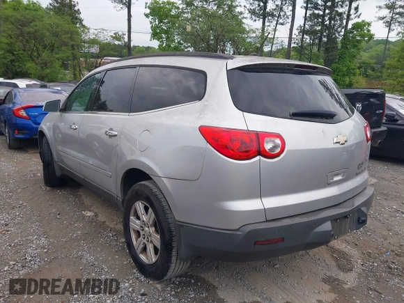 2012 Chevrolet Traverse 1LT with VIN 1GNKRGED5CJ255266, listed as a IAAI auction lot 42093175 with 103,730 mi miles and . Bid and sale history available at DreamBid. Image 3.