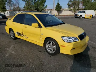 2002 Mitsubishi Lancer OZ-Rally with VIN JA3AJ86E82U071265, listed as a Copart auction lot 77711904 with 174,088 mi miles and Salvage Title. Bid and sale history available at carsss.com. Image 4.