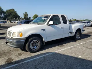 1999 Ford F-150 with VIN 1FTRX07WXXKC00489, listed as a Copart auction lot 64337605 with Not provided miles and Clean title. Bid and sale history available at DreamBid. Image 1.