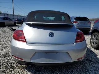 2015 Volkswagen Beetle 1.8T with VIN 3VW517AT8FM810709, listed as a Copart auction lot 48065314 with 61,924 mi miles and Salvage Title. Bid and sale history available at DreamBid. Image 6.