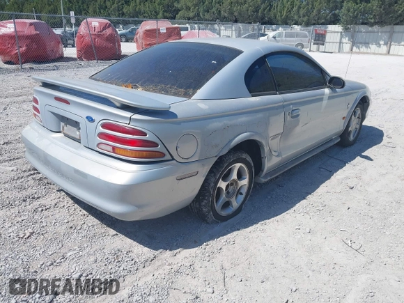 1995 Ford Mustang with VIN 1FALP4047SF170414, listed as a IAAI auction lot 42079990 with 106,398 mi miles. Bid and sale history available at carsss.com. Image 4.
