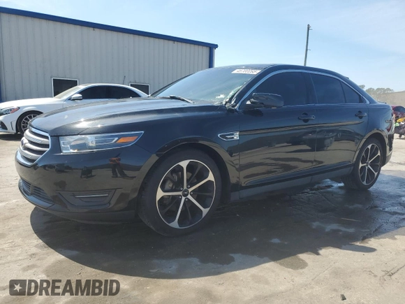 2015 Ford Taurus SEL with VIN 1FAHP2E87FG208522, listed as a Copart auction lot 46700095 with 97,439 mi miles and Salvage title. Bid and sale history available at DreamBid. Image 1.
