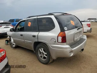 2005 GMC Envoy SLT with VIN 1GKDT13S152124404, listed as a Copart auction lot 64011494 with 212,951 mi miles and Salvage Title. Bid and sale history available at DreamBid. Image 2.