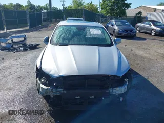 2019 Ford Fusion Titanium with VIN 3FA6P0RUXKR141565, listed as a IAAI auction lot 42323999 with 206,397 mi miles and . Bid and sale history available at DreamBid. Image 13.