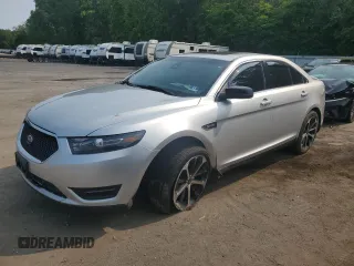 2015 Ford Taurus SHO with VIN 1FAHP2KT7FG188233, listed as a Copart auction lot 59669405 with 179,713 mi miles and Salvage title. Bid and sale history available at DreamBid. Image 1.