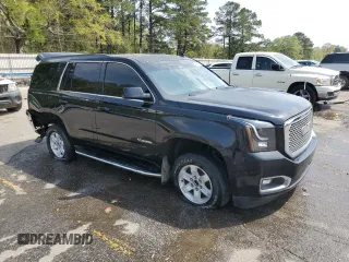 2015 GMC Yukon SLT with VIN 1GKS1BKC0FR113013, listed as a Copart auction lot 49821495 with 294,596 mi miles and Salvage Title. Bid and sale history available at carsss.com. Image 4.