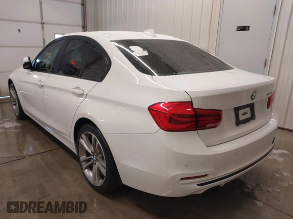 2016 BMW 3 Series 328i with VIN WBA8E9G5XGNT85247, listed as a IAAI auction lot 41578238 with 64,951 mi miles. Bid and sale history available at carsss.com. Image 3.